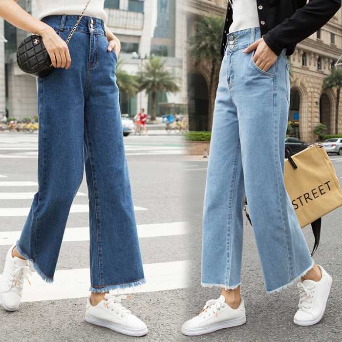 Quần jean xanh tua gấu phối đồ cực dễ dàng với Fly88 com giải trí trực tuyến