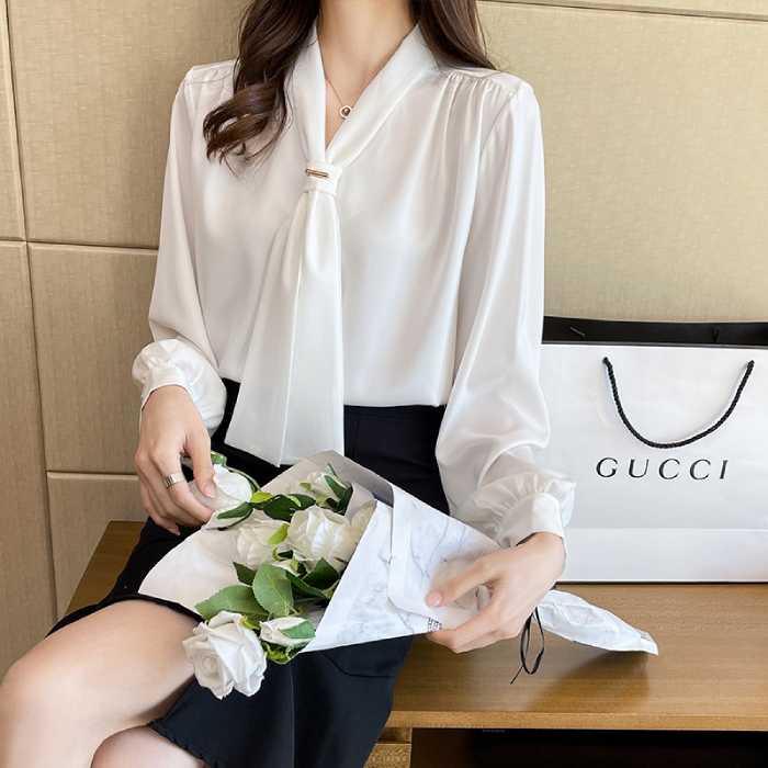 Mẫu áo Trang Chủ Fly88.Com Uy Tín Đẳng Cấp Số 1 Châu Á sơ mi trắng thắt nơ phối Fly88com code khuyến mãi xẻ tà quyến rũ