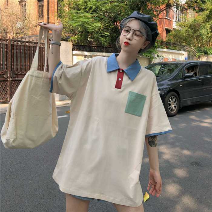 Mẫu Fly88 com giải trí trực tuyến polo oversize màu be nhạt nhẹ nhàng