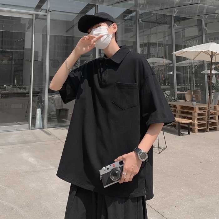 Mẫu Fly88 com giải trí trực tuyến polo oversize form rộng màu đen trơn