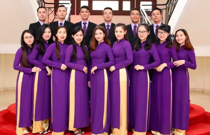 Mẫu áo dài Nhà Cái FLY88.COM Xanh Chín, Uy Tín Tặng 188k Trang Chủ Fly88.Com Uy Tín Đẳng Cấp Số 1 Châu Á đẹp của ngân hàng TP bank có màu tím đặc trưng