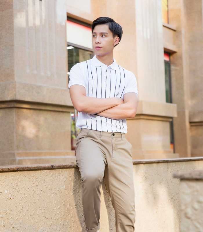 Chàng trai trẻ trung khi mix Fly883 Mở Tài Khoản kẻ và quần tây