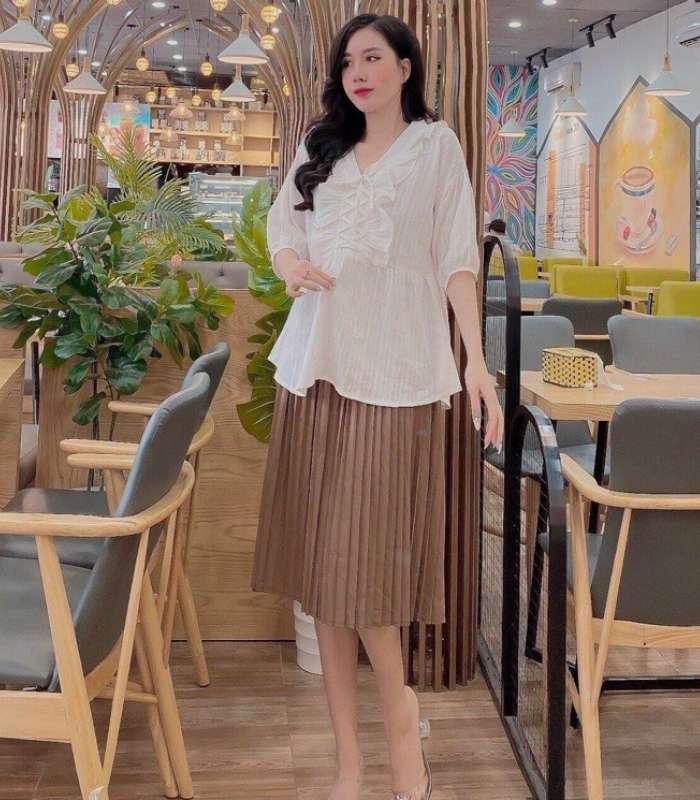 Diện Flai88 nhà cái OkVip bầu Trang Chủ Fly88.Com Uy Tín Đẳng Cấp Số 1 Châu Á duyên dáng với váy xếp ly