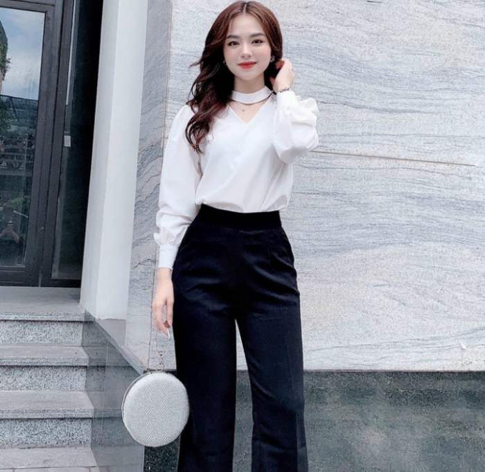 Áo sơ mi trắng tay bồng mix với quần âu đen tạo thành set Flai88 nhà cái OkVip yêu thích của chị em Trang Chủ Fly88.Com Uy Tín Đẳng Cấp Số 1 Châu Á