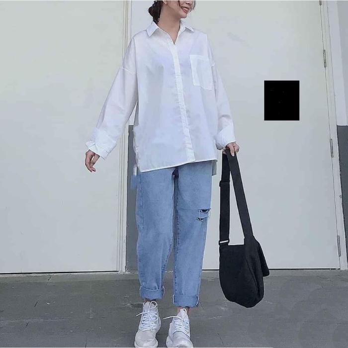 Kết hợp FLY88 tặng nạp đầu 188K cùng quần jeans dáng baggy mang đến phong cách năng động cho cô nàng