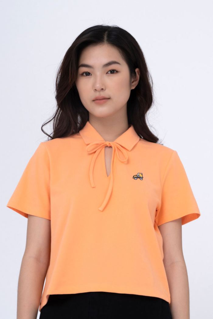 Năng động, trẻ trung trong chiếc Fly88 com giải trí trực tuyến polo mang sắc cam