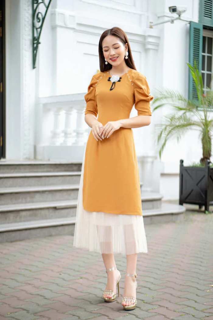 Mẫu áo dài Trang Chủ Fly88.Com Uy Tín Đẳng Cấp Số 1 Châu Á cách tân tay bồng quyến rũ