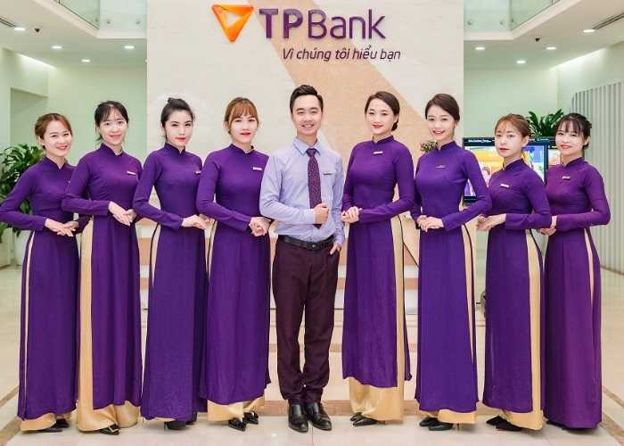 Mẫu áo dài Nhà Cái FLY88.COM Xanh Chín, Uy Tín Tặng 188k Trang Chủ Fly88.Com Uy Tín Đẳng Cấp Số 1 Châu Á màu tím đặc trưng của nhân viên TP Bank