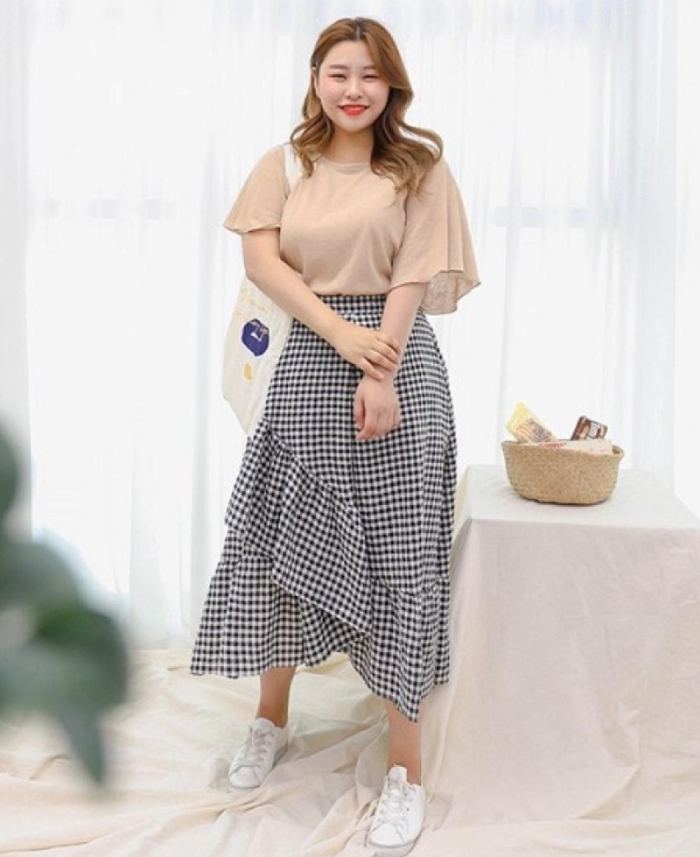Áo lụa cánh rơi mix cùng Fly88com code khuyến mãi đuôi cá giúp cô nàng thêm phần điệu đà